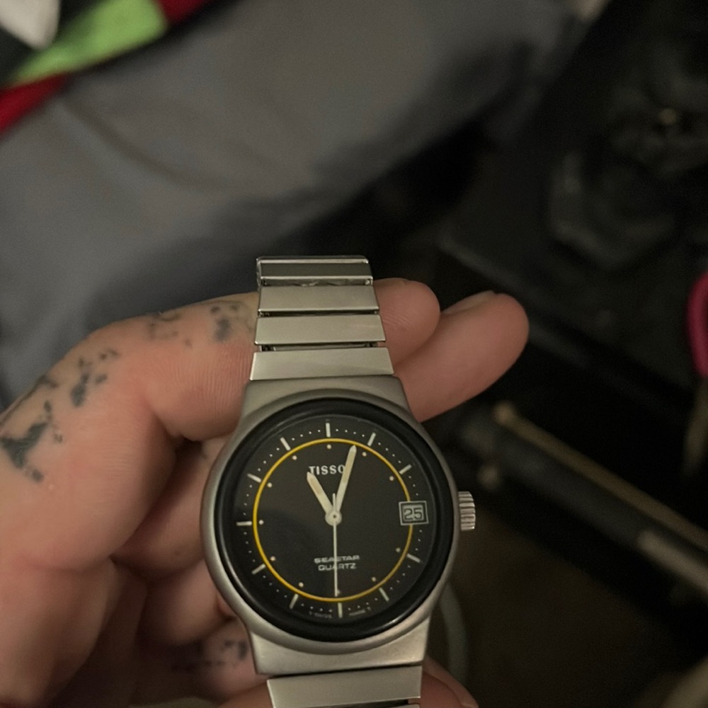 Tissot wrist watch. Seastayquartz stainless steal water resistant 330 ft